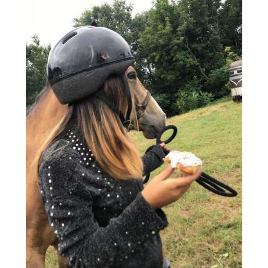 horse girl wearing a helmet